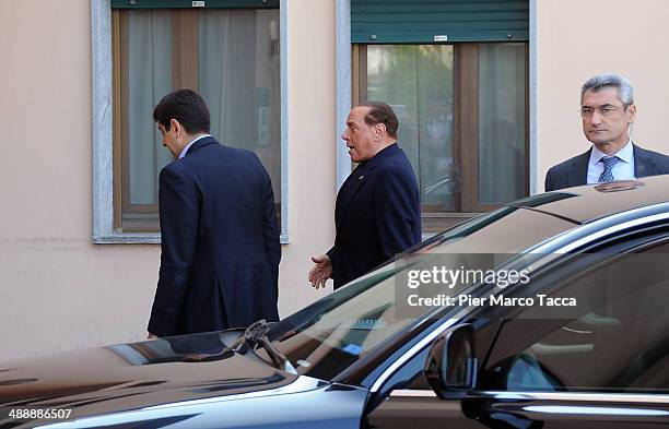 Silvio Berlusconi arrives at Fondazione Sacra Famiglia in Cesano Bosconeon May 9, 2014 in Milan, Italy. Today Silvio Berlusconi starts his community...