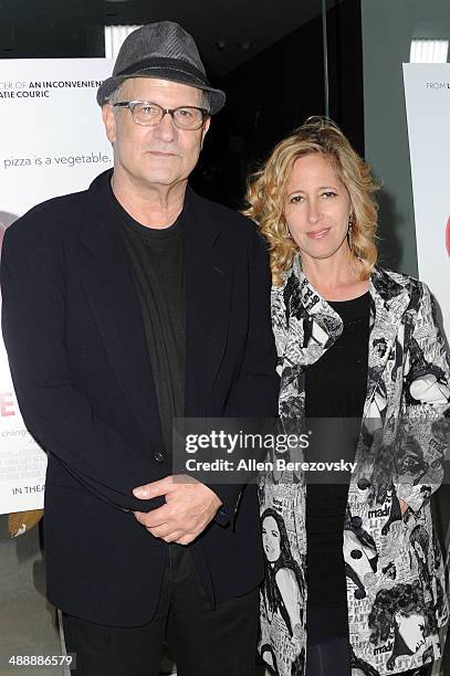 Actor Albert Brooks and a guest arrive at the Los Angeles premiere of "Fed Up" at Pacfic Design Center on May 8, 2014 in West Hollywood, California.