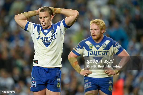 Tim Browne and James Graham of the Bulldogs show their dejection during the First NRL Semi Final match between the Sydney Roosters and the Canterbury...