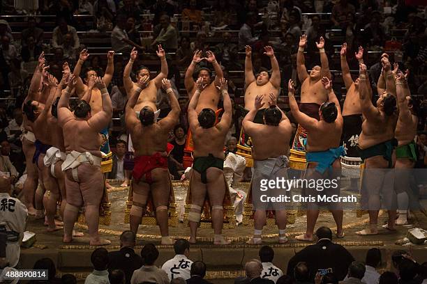 Wrestlers enter the ring during the Tokyo Grand Sumo tournament at the Ryogoku Kokugikan on September 17, 2015 in Tokyo, Japan. Japanese Sumo is an...