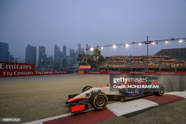 Manor Marussia F1 Team British driver Will Stevens drives his car during the first free practice session of the Formula One Singapore Grand Prix in...