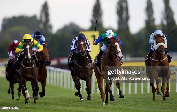 Jimmy Fortune riding Christchurch win The Al Basti Equiworld EBF Stallions Maiden Stakes at Newbury racecourse on September 18, 2015 in Newbury,...