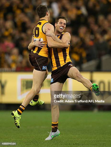 Isaac Smith of the Hawks celebrates a goal with Matthew Suckling during the 2015 AFL Second Semi Final match between the Hawthorn Hawks and the...