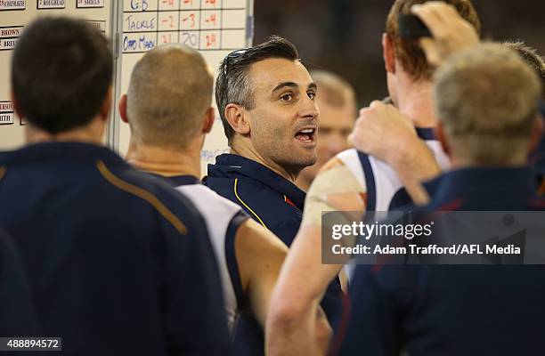 Scott Camporeale, Interim Coach of the Crows addresses his players during the 2015 AFL Second Semi Final match between the Hawthorn Hawks and the...