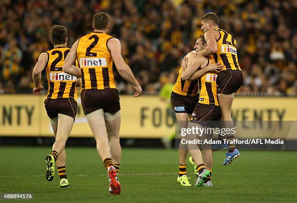 Isaac Smith of the Hawks celebrates a goal with Matthew Suckling during the 2015 AFL Second Semi Final match between the Hawthorn Hawks and the...