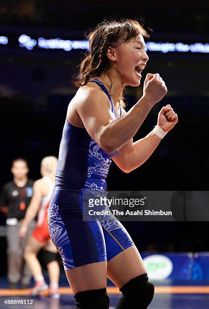 Eri Tosaka of Japan celebrates winning the gold in the Women's -48kg during day three of the World Wrestling Championships at the Orleans Arena on...