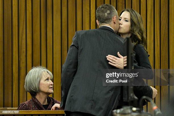 Oscar Pistorius is greeted by his sister, Aimee, at the Pretoria High Court on May 9 in Pretoria, South Africa. Oscar Pistorius stands accused of the...