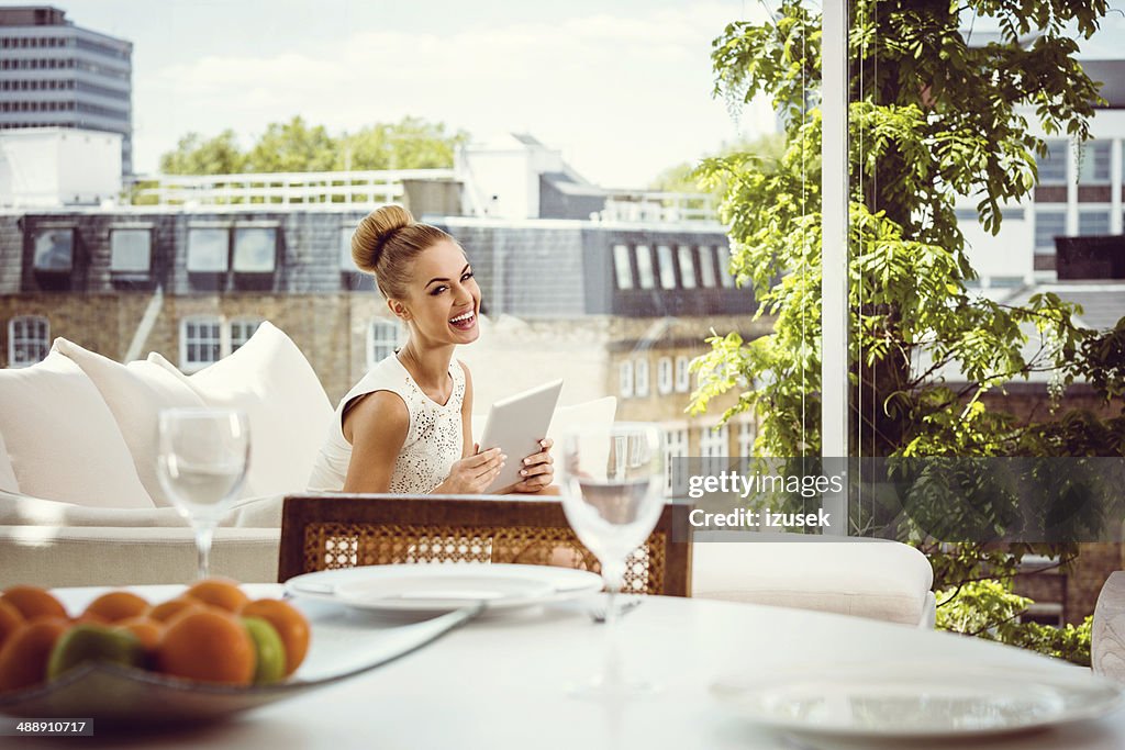 Elegant woman with digital tablet