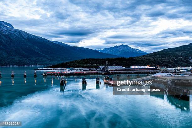 skagway harbor at dawn - skagway alaska stock pictures, royalty-free photos & images