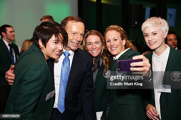 Australian Prime Minister Tony Abbott poses for a photo with members of the 2014 Sochi Australian Olympic team during the Official Welcome Home...