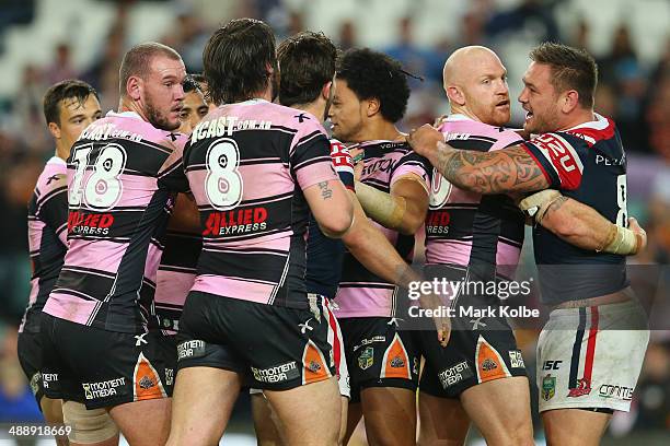 Players scuffle during the round nine NRL match between the Sydney Roosters and the Wests Tigers at Allianz Stadium on May 9, 2014 in Sydney,...