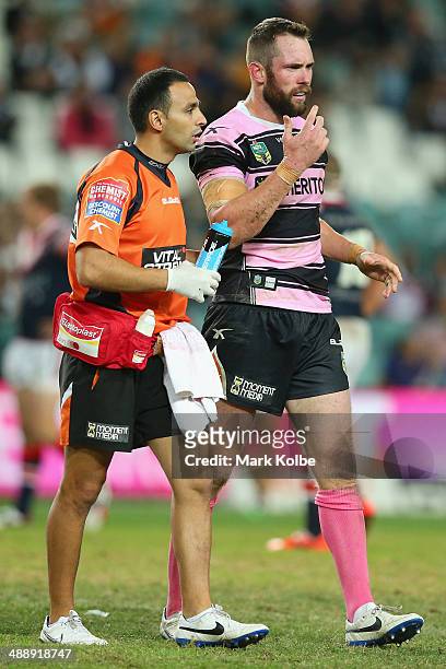 Pat Richards of the Tigers leaves the field during the round nine NRL match between the Sydney Roosters and the Wests Tigers at Allianz Stadium on...