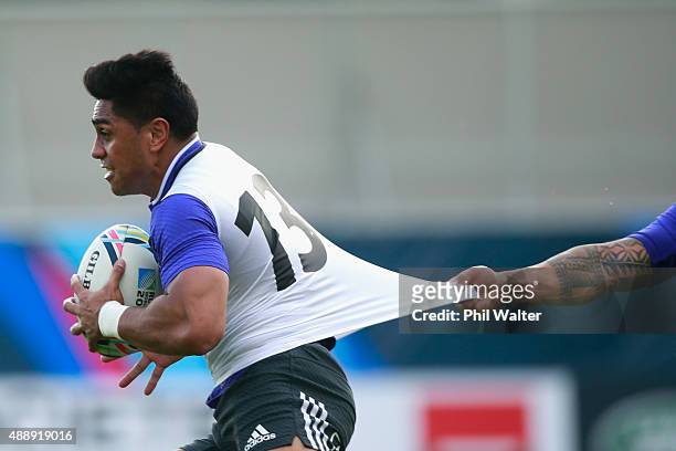 Malakai Fekitoa of the All Blacks is tackled by Maa Nonu during a New Zealand All Blacks training session at Lensbury on September 18, 2015 in...
