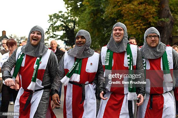 An England rugby fans in fancy dress arrive at Twickenham Stadium ahead of the World Cup opening ceremony on September 18, 2015 in London, England....