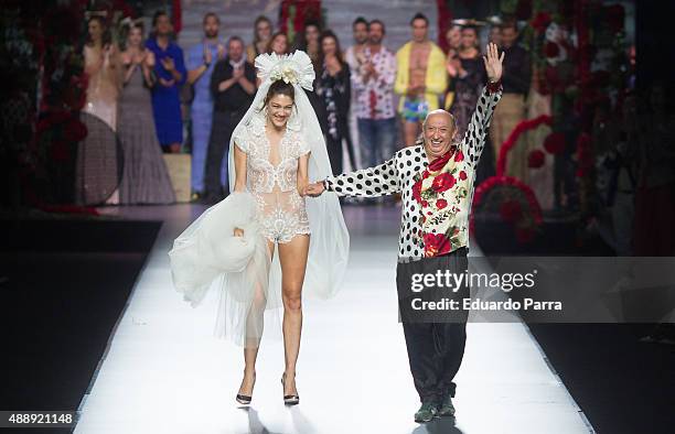 Designer Francis Montersinos and a model on the runway at the Francis Montesinos show during Mercedes-Benz Fashion Week Madrid Spring/Summer 2015/16...