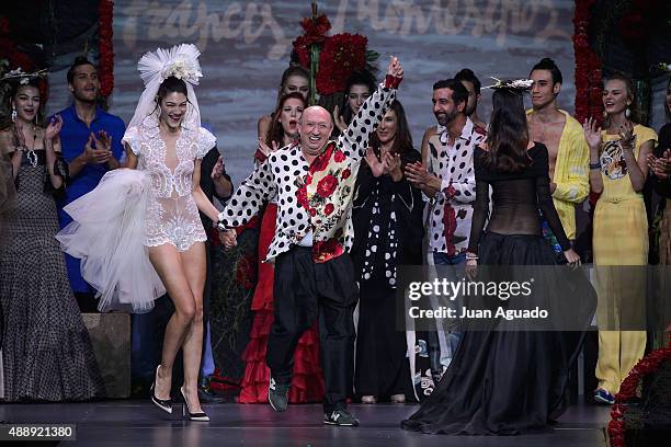 Spanish fashion designer Francis Montesinos salutes on the runway at the Francis Montesinos show during Mercedes-Benz Fashion Week Madrid...