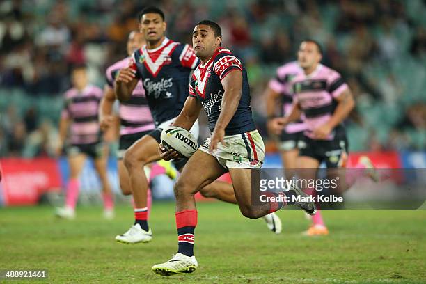 Michael Jennings of the Roosters makes a break on his way to score a try during the round nine NRL match between the Sydney Roosters and the Wests...
