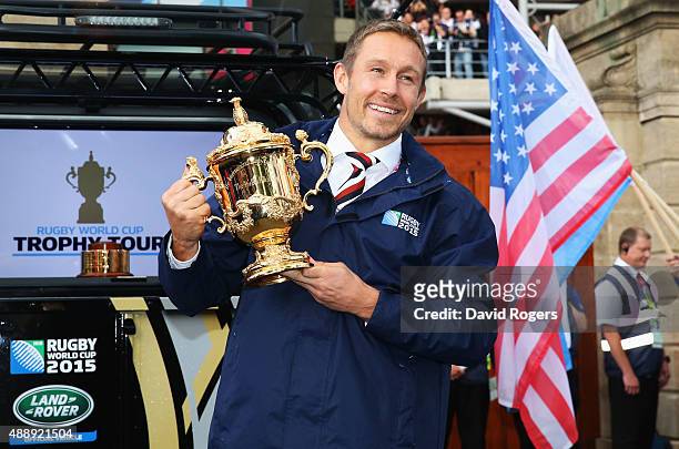 Jonny Wilkinson delivers the Webb Ellis Trophy to the stadium prior to the 2015 Rugby World Cup Pool A match between England and Fiji at Twickenham...