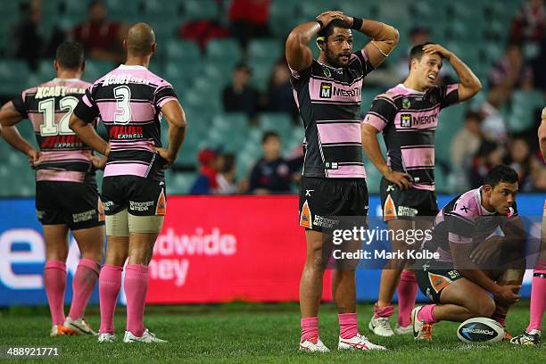 Adam Blair of the Tigers and his team mates look dejected after a Roosters try during the round nine NRL match between the Sydney Roosters and the...