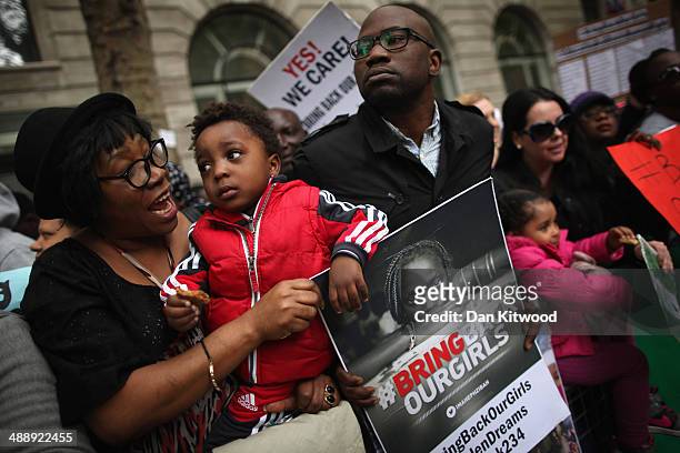 Protesters calling for the release of 276 abducted Nigerian schoolgirls gather outside Nigeria House on May 9, 2014 in London, England. 276...
