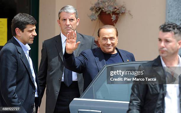 Silvio Berlusconi leaves the Fondazione Sacra Famiglia on May 9, 2014 in Milan, Italy. Today Silvio Berlusconi starts his community service for tax...