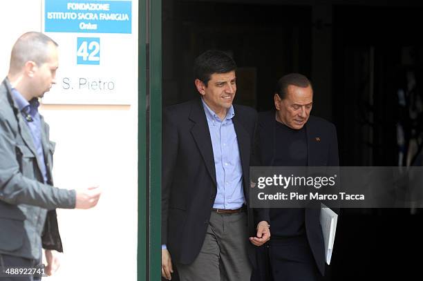 Silvio Berlusconi leaves the Fondazione Sacra Famiglia on May 9, 2014 in Milan, Italy. Today Silvio Berlusconi starts his community service for tax...