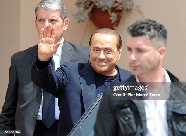 Silvio Berlusconi leaves the Fondazione Sacra Famiglia on May 9, 2014 in Milan, Italy. Today Silvio Berlusconi starts his community service for tax...