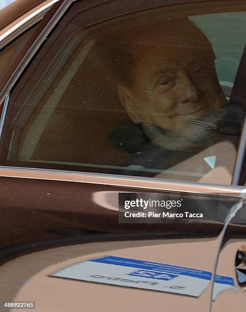 Silvio Berlusconi leaves the Fondazione Sacra Famiglia on May 9, 2014 in Milan, Italy. Today Silvio Berlusconi starts his community service for tax...