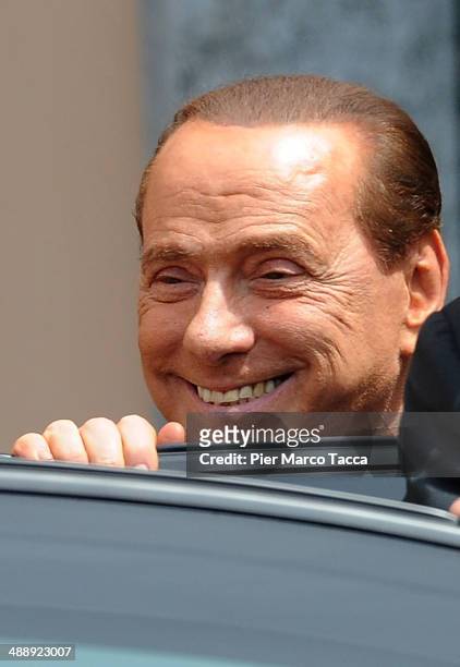 Silvio Berlusconi leaves the Fondazione Sacra Famiglia on May 9, 2014 in Milan, Italy. Today Silvio Berlusconi starts his community service for tax...