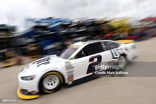 Brad Keselowski, driver of the Miller Lite Ford, pulls out of the garage during practice for the NASCAR Sprint Cup Series myAFibRisk.com 400 at...