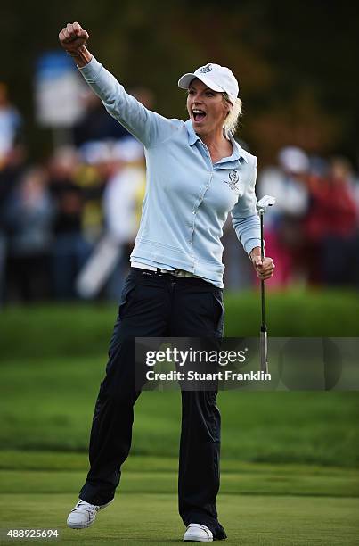 Melissa Reid of team Europe celebrates holeing her putt on the 16th hole during the afternoon fourball matches at The Solheim Cup at St Leon-Rot Golf...