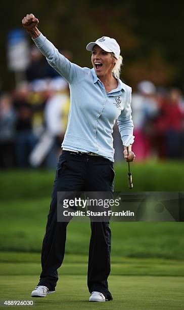 Melissa Reid of team Europe celebrates holeing her putt on the 16th hole during the afternoon fourball matches at The Solheim Cup at St Leon-Rot Golf...