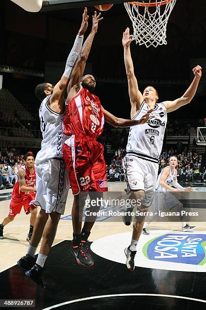 Kyle Gibson of Giorgio Tesi Group competes with Jerome Jordan and Viktor Gaddefors of Granarolo during the LegaBasket match between Granarolo Bologna...