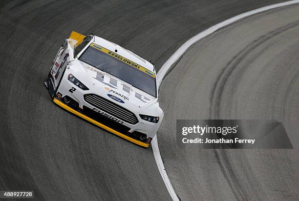 Brad Keselowski, driver of the Miller Lite Ford, drives during practice for the NASCAR Sprint Cup Series myAFibRisk.com 400 at Chicagoland Speedway...