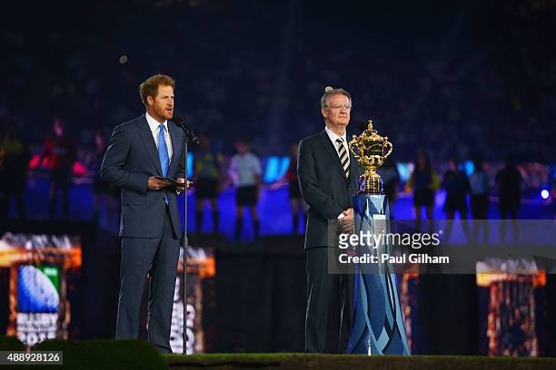 Prince Harry speaks as World Rugby Chairman Bernard Lapasset looks on during the opening ceremoy ahead of the 2015 Rugby World Cup Pool A match...