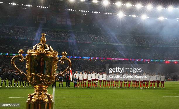 The Webb Ellis Cup is seen as England and Fiji observe the national anthem during the 2015 Rugby World Cup Pool A match between England and Fiji at...