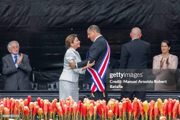 Outgoing president of Costa Rica Laura Chinchilla talks after giving the presidential sash to elected president Luis Guillermo Solis at National...