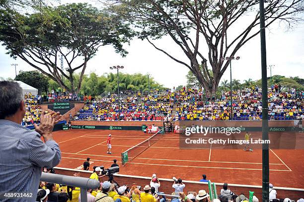 View of the Davis Cup World Group Play-off singles match between Santiago Giraldo of Colombia and Taro Daniel of Japan at Club Campestre on September...