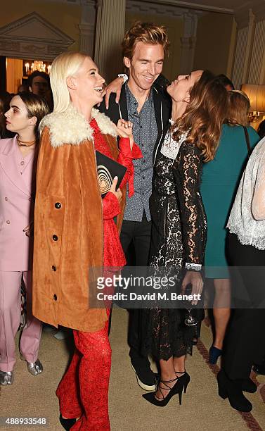 Poppy Delevingne, James Cook and Alexa Chung attend the London Fashion Week party hosted by Ambassador Matthew Barzun and Mrs Brooke Brown Barzun...