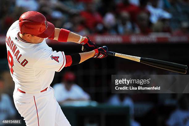 John McDonald of the Los Angeles Angels of Anaheim bats against the Texas Rangers at Angel Stadium of Anaheim on May 4, 2014 in Anaheim, California.