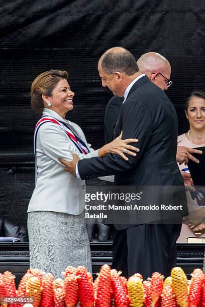 Outgoing president of Costa Rica Laura Chinchilla talks after giving the presidential sash to elected presidente Luis Guillermo Solis at National...