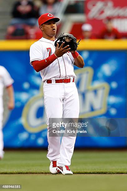 Ramon Santiago of the Cincinnati Reds catches the ball during the game against the Milwaukee Brewers at Great American Ball Park on May 2, 2014 in...