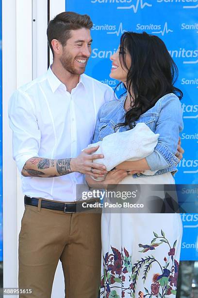 Real Madrid player Sergio Ramos and Pilar Rubio present their new born son Sergio outside Hospital La Moraleja on May 9, 2014 in Madrid, Spain.