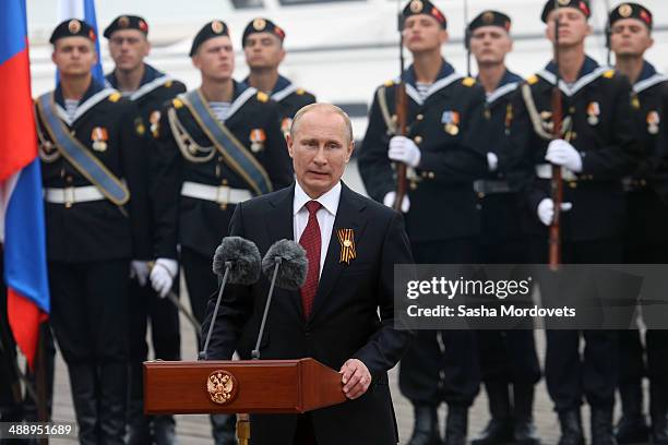 Russian President Vladimir Putin attends a military parade on May 9, 2014 in Sevastopol, Russia. Putin is having a one-day visit to Crimea which...