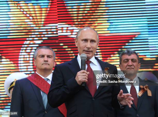 Russian President Vladimir Putin attends a military parade on May 9, 2014 in Sevastopol, Russia. Putin is having a one-day visit to Crimea which...