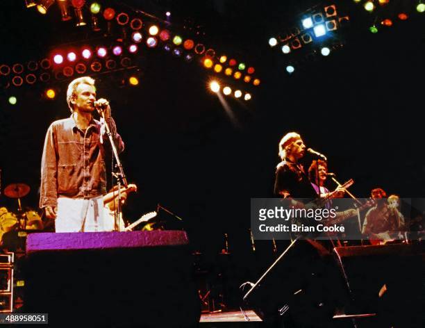 Sting performing with Dire Straits at The Princes Trust 10th Birthday Party at Wembley Arena on June 20 1986. L-R Sting, Mark Knopfler, John Illsley...