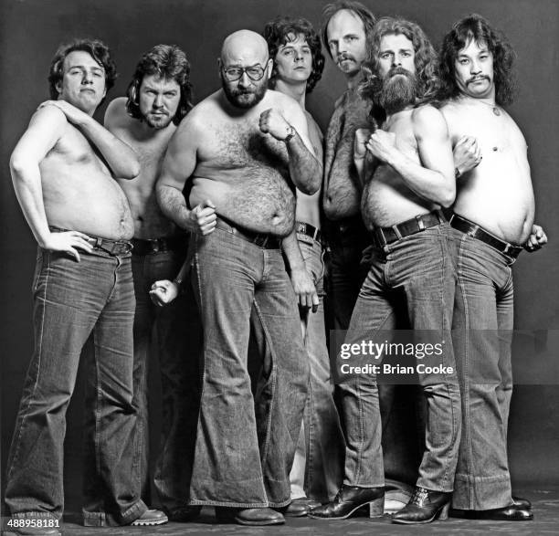 Andy Parker, Tony Dunmore, Albie Donnelly, Dave Irving, Les Karski, Bob Robertson and Ozzie Yue of Supercharge posing in a Covent Garden photo studio...