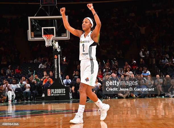 Candice Wiggins of the New York Liberty raises her hands after the play against the Washington Mystics during game One of the WNBA Semi-Finals at...