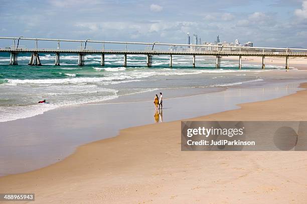 sand pumping pier main beach gold coast australia - main beach gold coast stock pictures, royalty-free photos & images