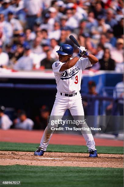 Cesar Izturis of the Los Angeles Dodgers bats against the San Francisco Giants at Dodger Stadium on April 2, 2002 in Los Angeles, California.